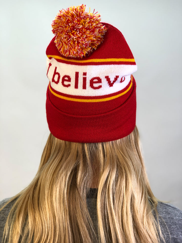 i believe beanie hat in red and yellow shown from back