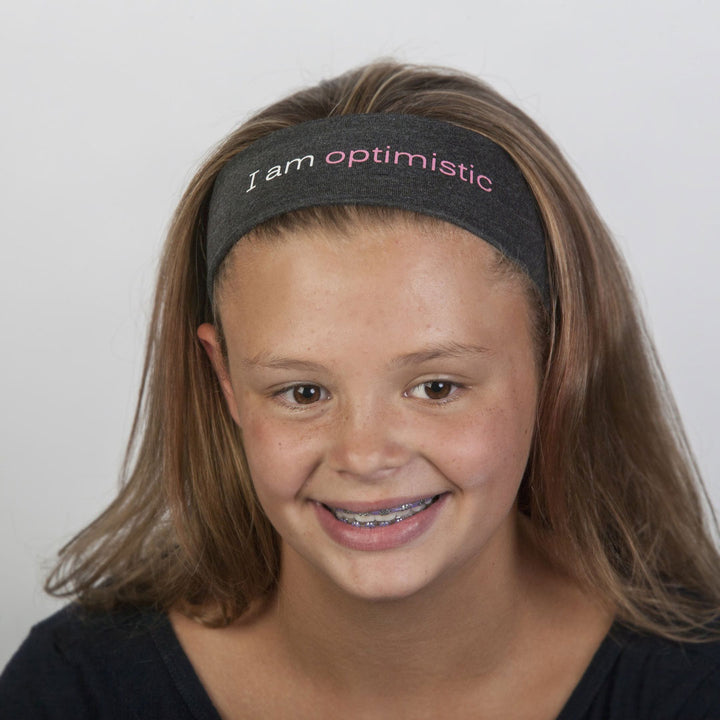 i am optimistic grey headband with positive message