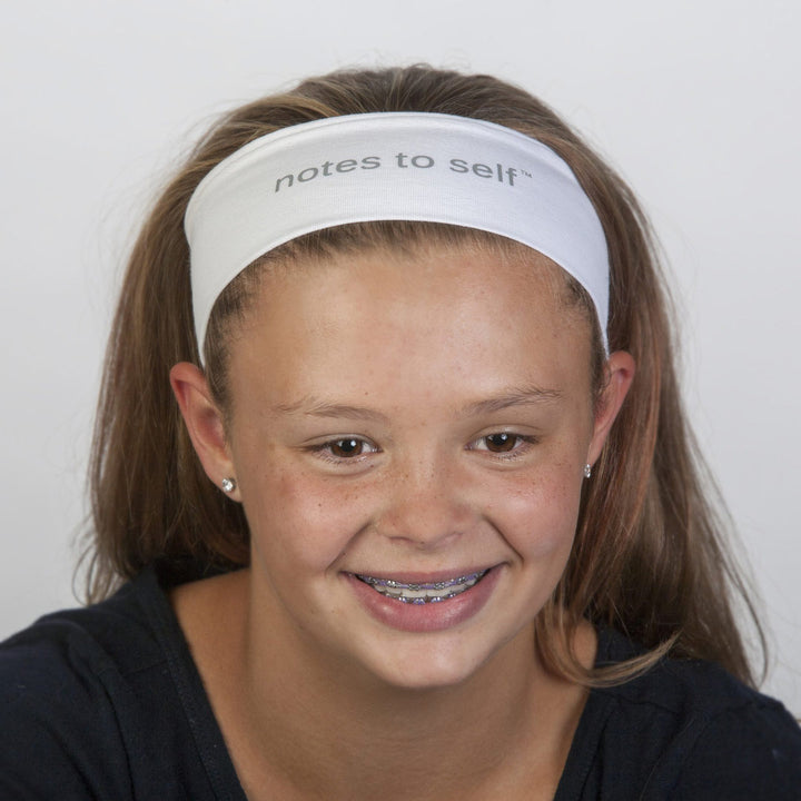 i am optimistic white headband with positive message