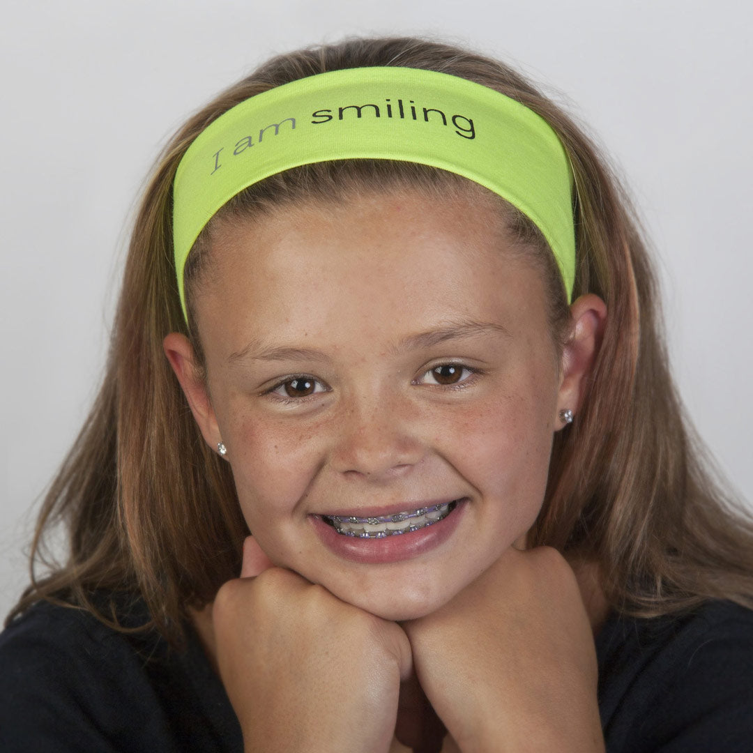 i am smiling neon yellow headband with positive message