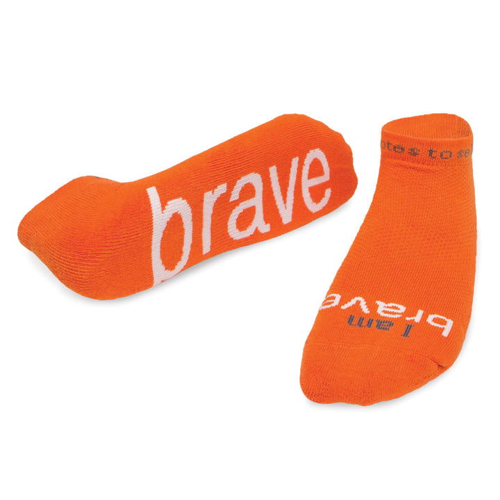 i am brave orange socks with white words