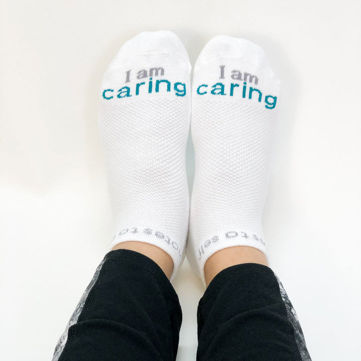 i am caring socks with positive message