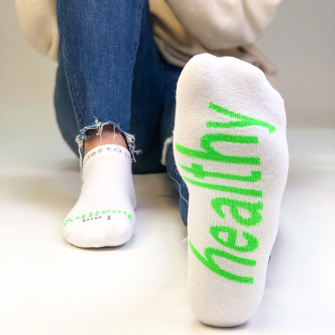 i am happy socks white with green words