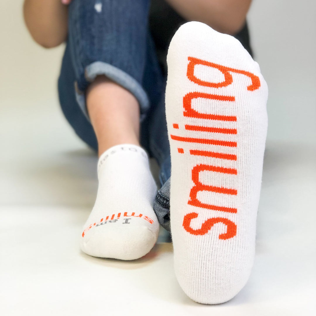 i am smiling white socks with positive message