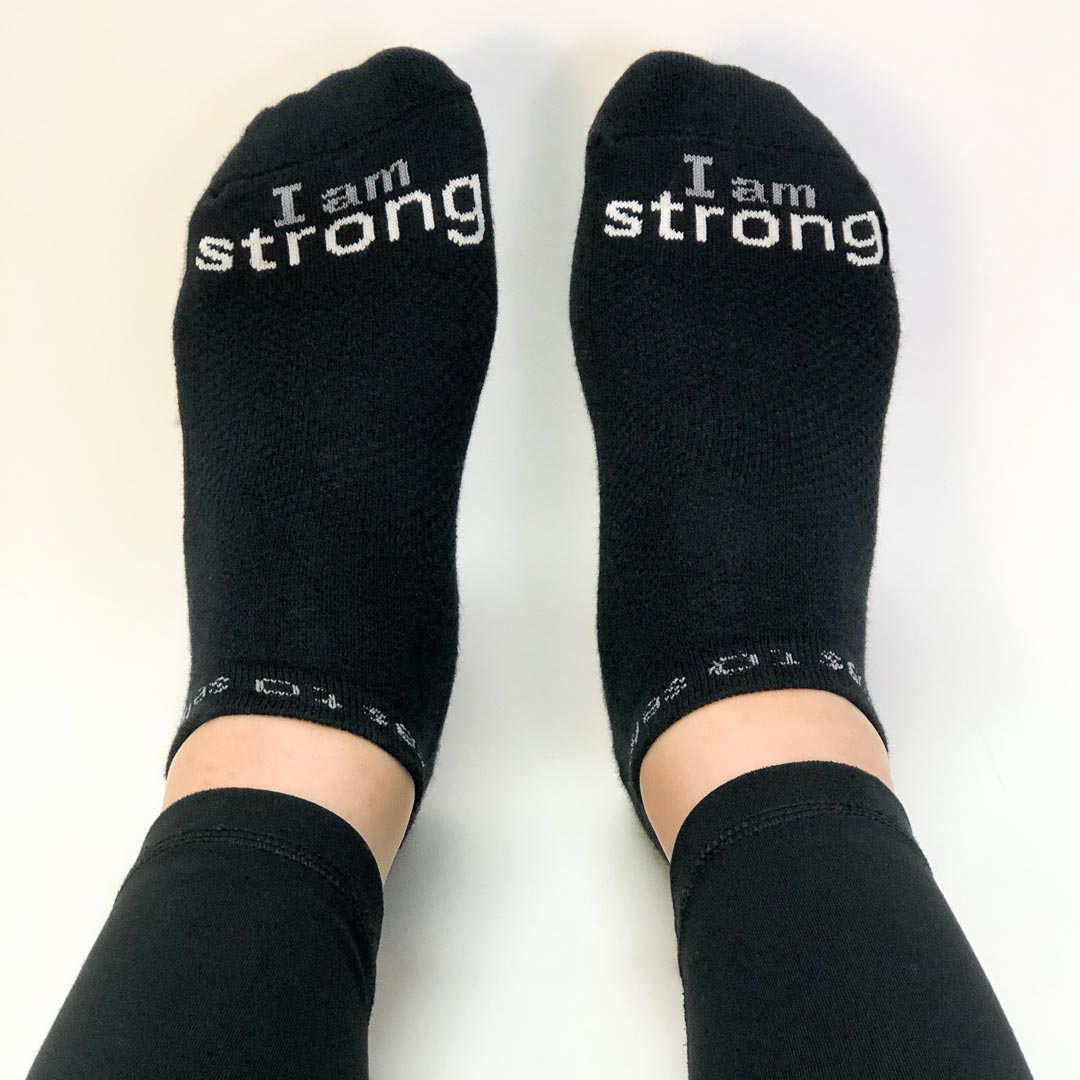 i am strong black socks with inspirational message