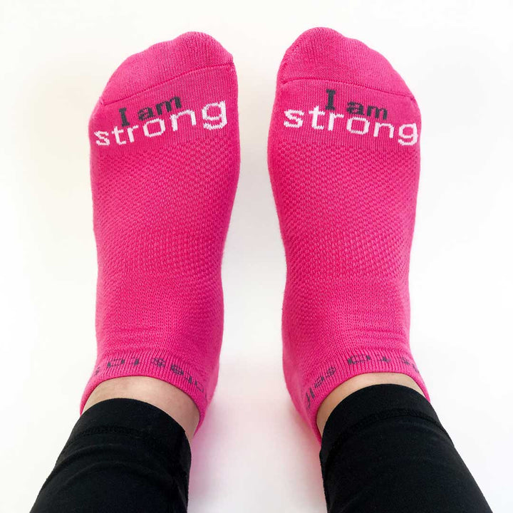i am strong bright pink socks with inspirational message