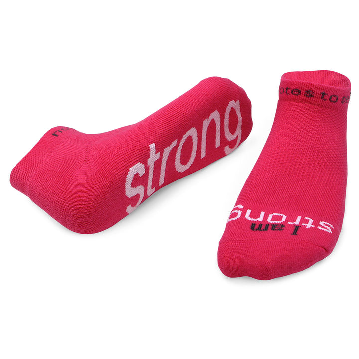 i am strong bright pink socks with white words