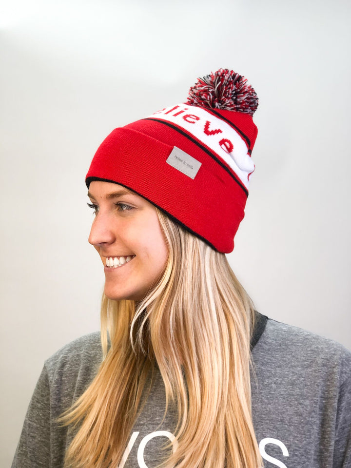 i believe beanie hat in red and white shown with single cuff